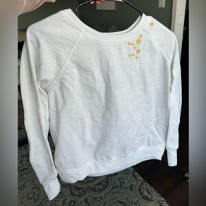 White sweater with stars